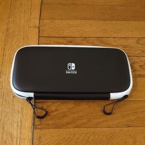 nintendo switch hard shelled double zipper case with elastic and game pocket